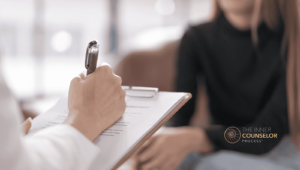 A therapist having a conversation with a patient.